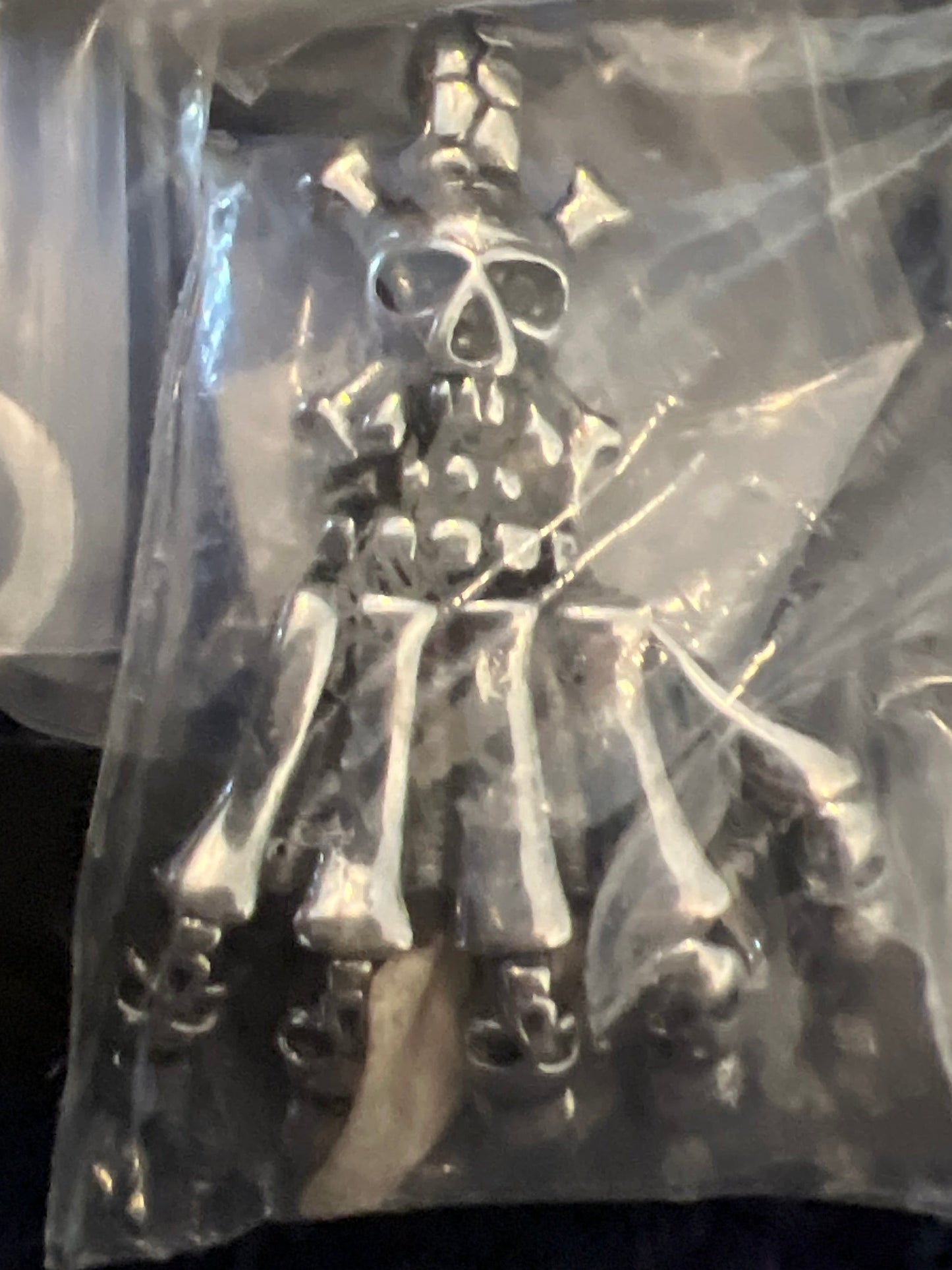 Skeleton hand pendant