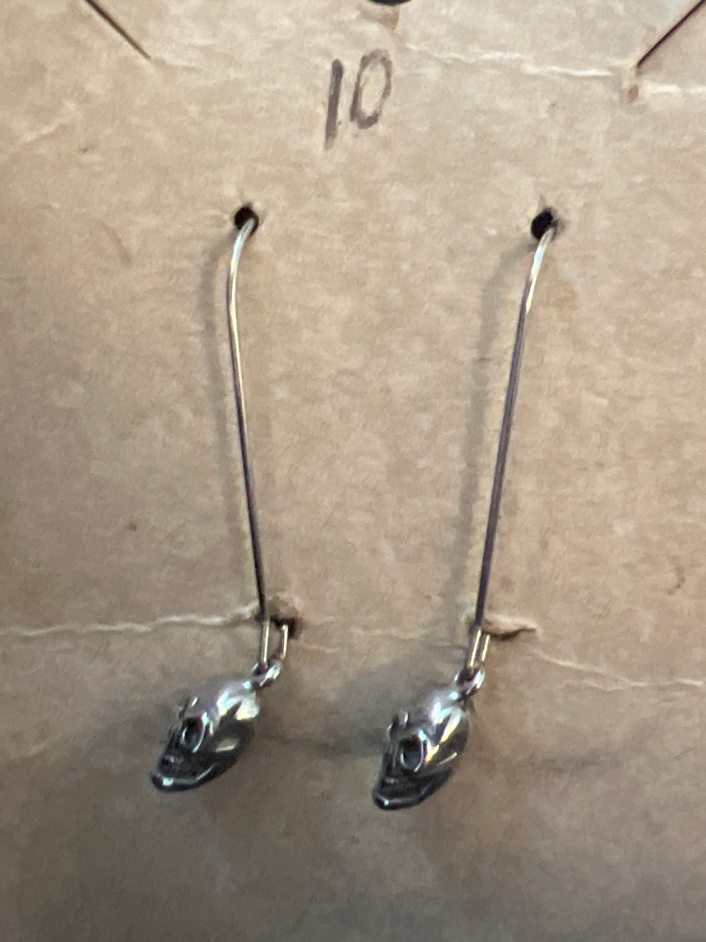 Skull long wire earrings