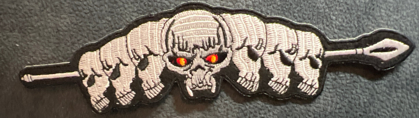 P#5027- Skulls on a spear