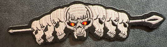 P#5027- Skulls on a spear